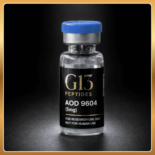 Vial labeled 'G13 Peptides AOD 9604' on a dark background